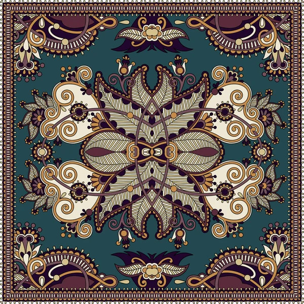 ornate symmetrical mandala pattern with floral and paisley motifs on a teal background