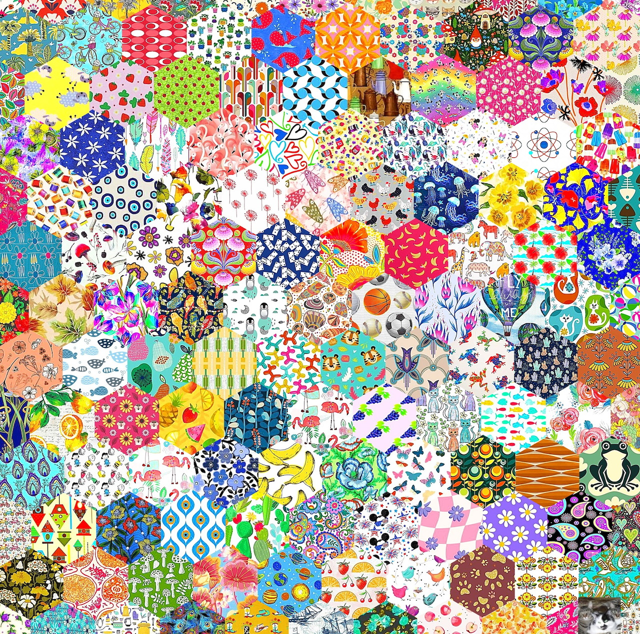 Densely packed patchwork quilt with colorful fabric squares featuring varied floral, geometric, and abstract patterns