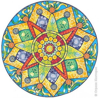 Colorful circular mandala with star and floral geometric patterns