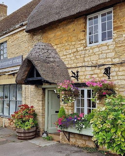 Country Cottage with Thatched Roof