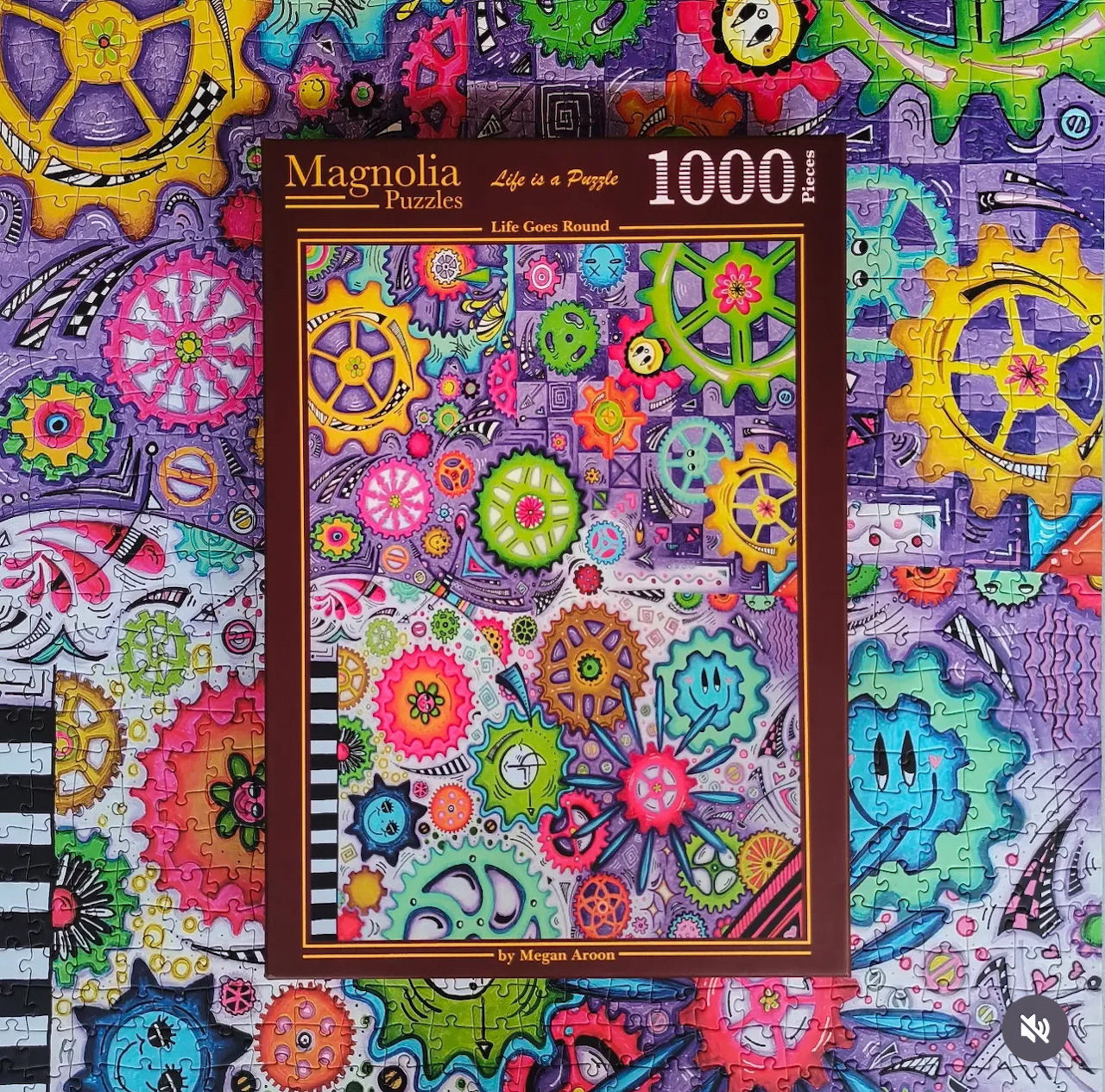 Colorful abstract pattern with gears, flowers, and a central puzzle box cover
