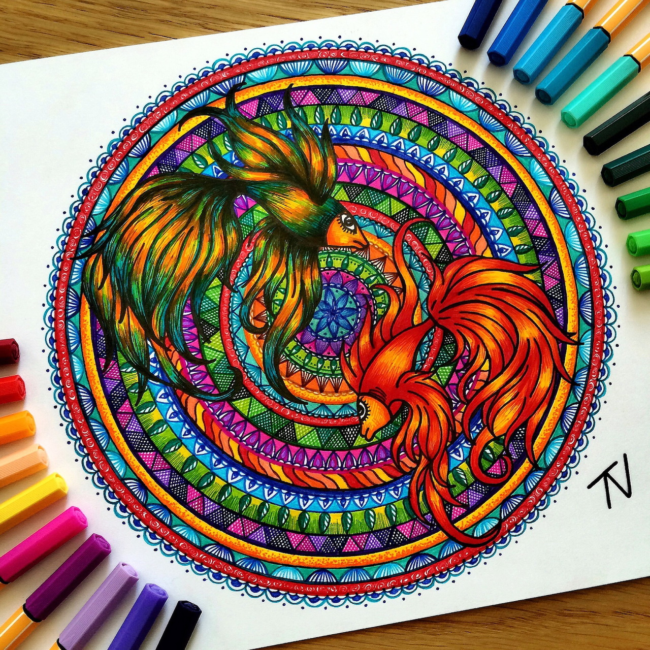 Colorful mandala with two decorative koi fish in circular pattern with intricate details and rainbow hues