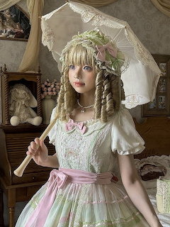 Woman in elaborate pastel lolita dress holding white lace parasol, blonde braided hair with flowers, vintage interior