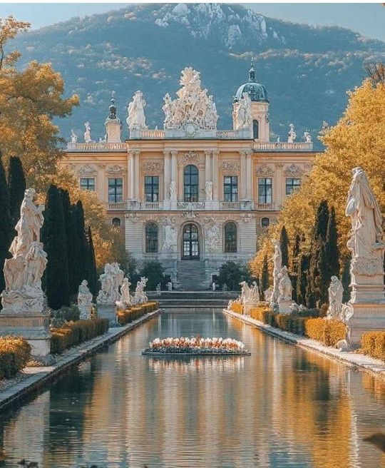 Schönbrunn Palace in Vienna with Baroque yellow facade and garden fountain