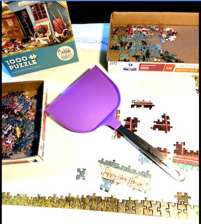 Puzzle Pieces and Dust Pan