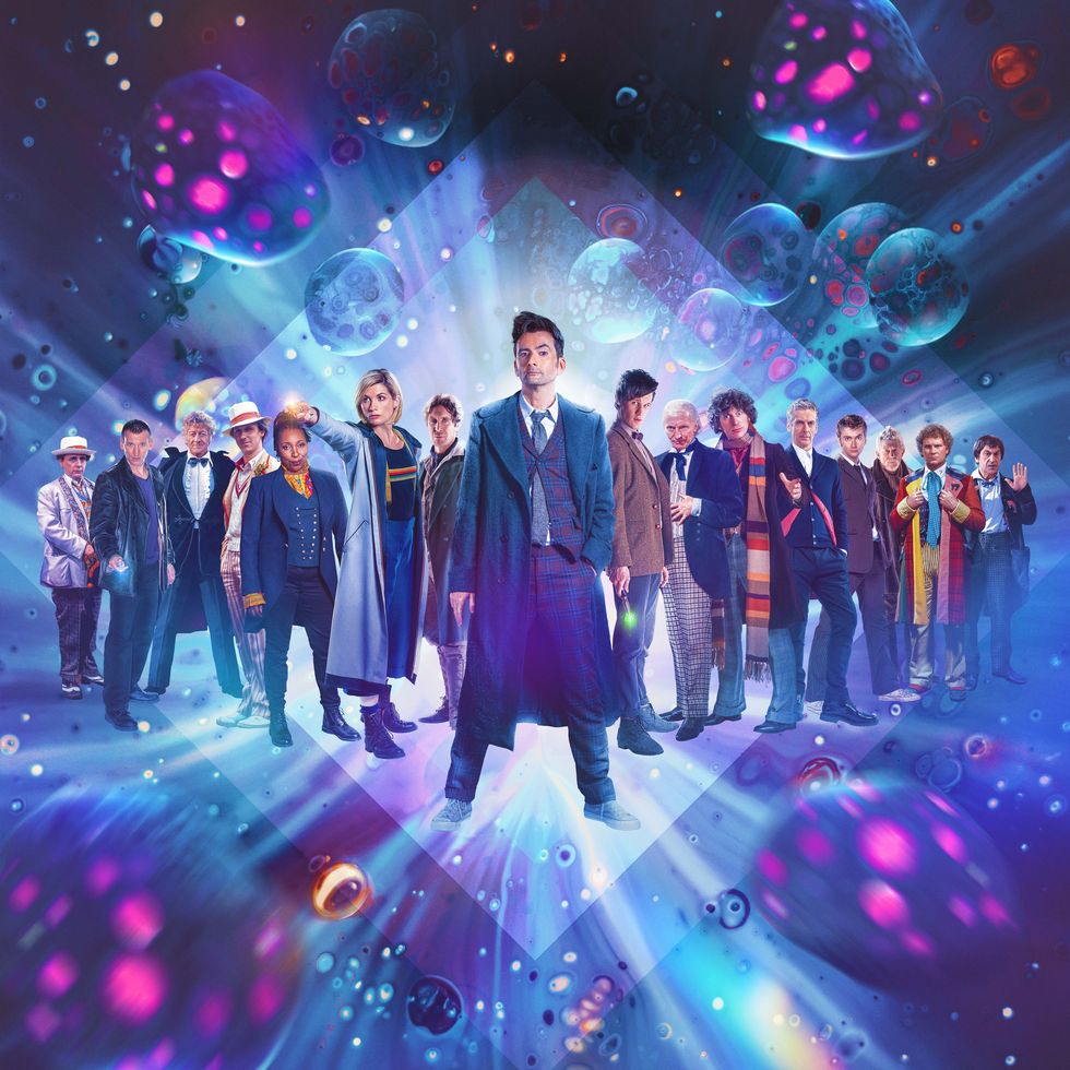 Doctor Who characters from different eras assembled in front of colorful cosmic background with planets and energy effects