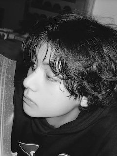 Boy with Curly Hair Profile