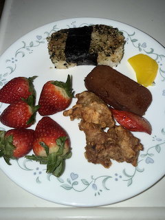 White plate with chocolate desserts, cookies, and fresh strawberries on decorative china