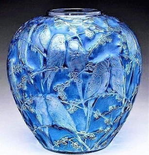 Blue decorative glass vase with embossed leaf pattern