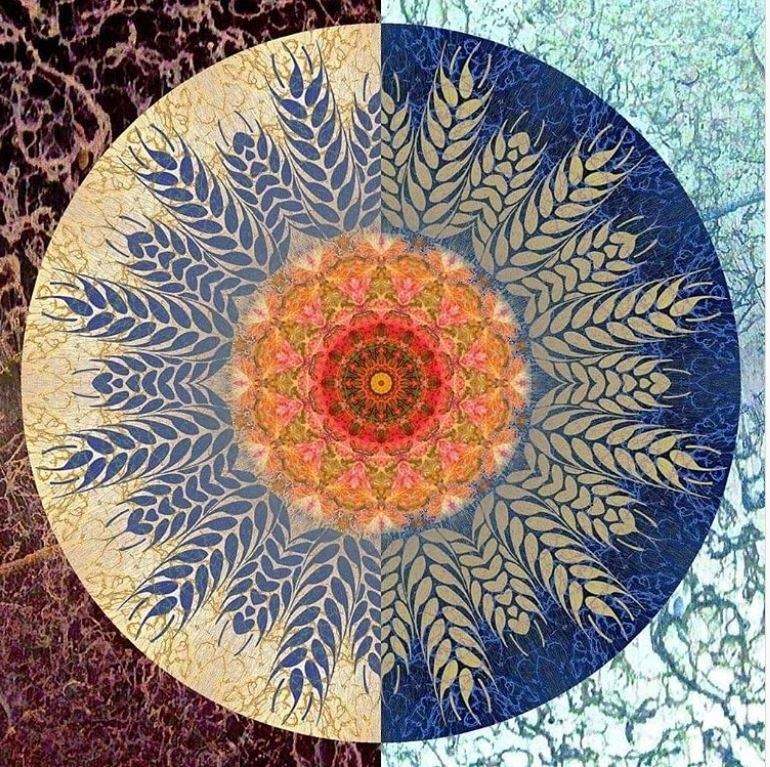 Circular mandala with radiating leaf patterns, warm orange center, blue middle ring, cream outer layer, textured corners