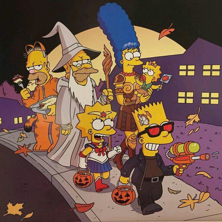 The Simpsons family dressed in Halloween costumes with pumpkins and haunted house