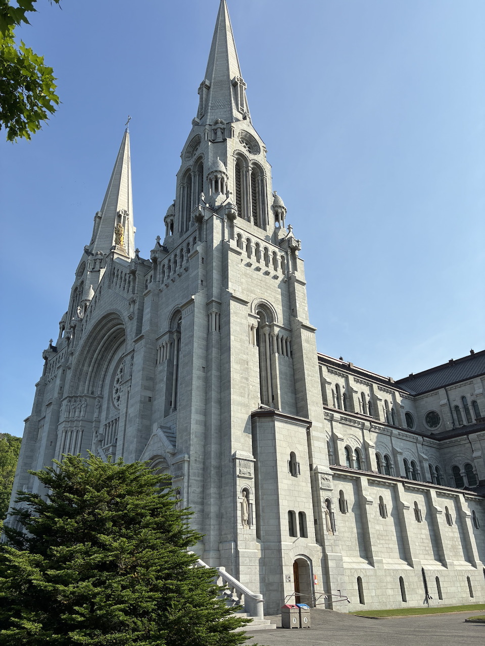 Twin-spired Gothic Revival facade of Sainte-Anne-de-Beaupré Basilica