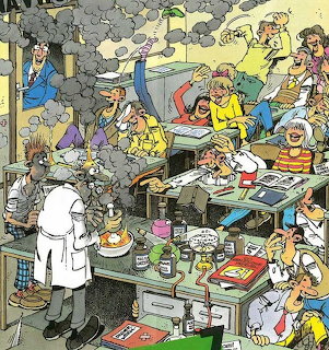Cartoon of a chaotic laboratory with scientists, smoke, tools, and people working at crowded tables