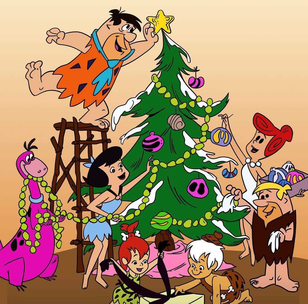The Flintstones family celebrating Christmas around a decorated tree with ornaments and star topper