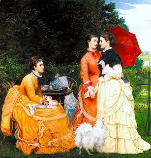 Three Victorian women in colorful gowns having tea in a garden setting, one holds a red parasol
