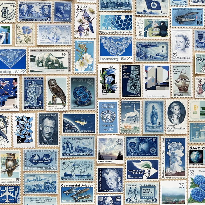 Grid collage of blue-toned vintage US postage stamps with various historical and cultural subjects