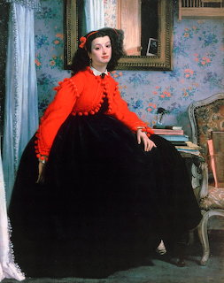 Victorian era portrait of woman in red jacket and black skirt seated in decorated room