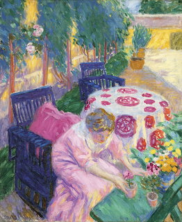 Woman in pink dress arranging flowers at outdoor table, impressionist painting style with vibrant colors and loose brushwork