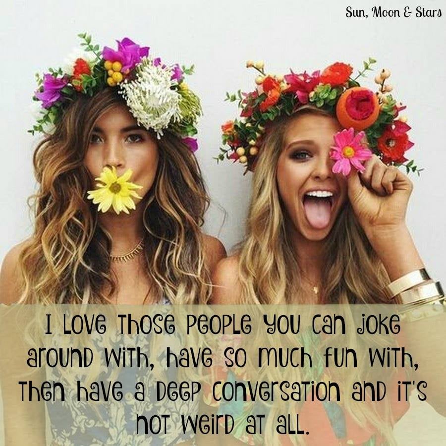 Two women in flower crowns pose playfully with a quote printed below