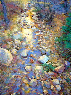 Impressionist painting of a sunlit rocky creek with colorful stones in blue, gold, and green tones