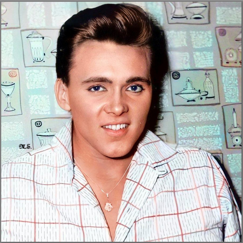 Vintage portrait of Billy Fury in a light striped shirt with a patterned background