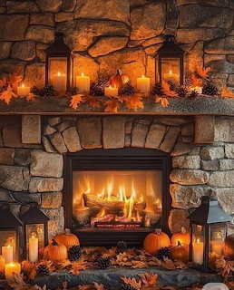 Stone fireplace with burning fire decorated with pumpkins, fall leaves, and lanterns