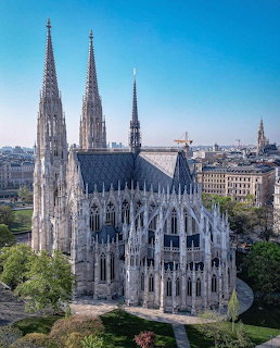 Aerial view of the Votivkirche neo-Gothic church with twin spires in Vienna, Austria