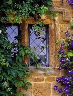 Stone Cottage Window with Clematis