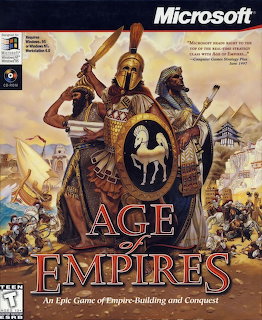 Age of Empires I PC game box art with ancient warriors, shield, and pyramids