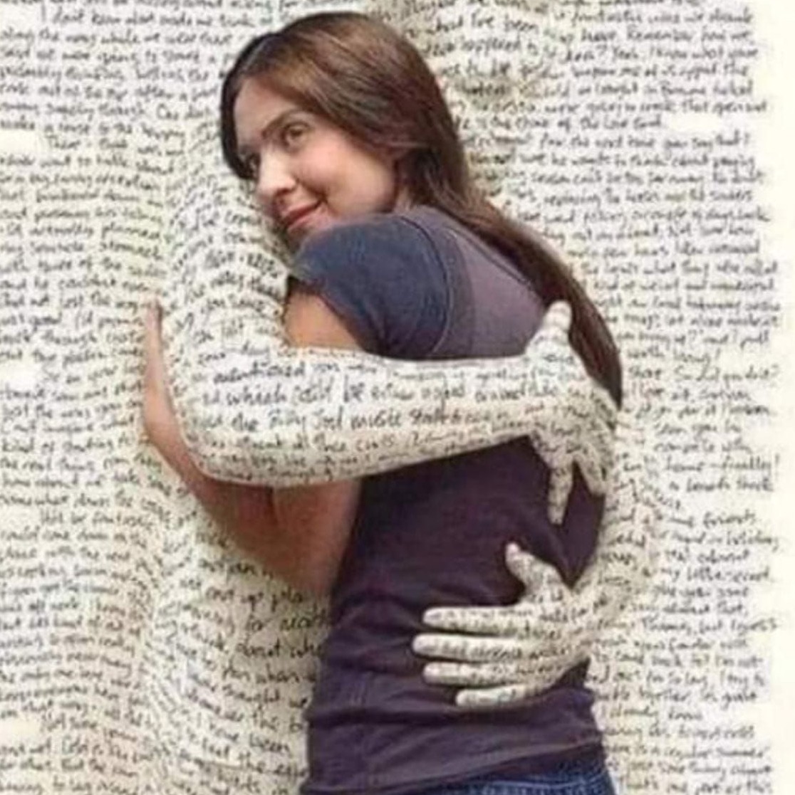 Woman hugging herself with arms wrapped around, set against handwritten text background