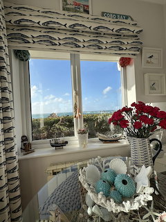 Coastal Window with Flowers
