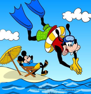 Mickey Mouse lounging on beach under umbrella while snorkeler with flippers swims overhead in blue sky