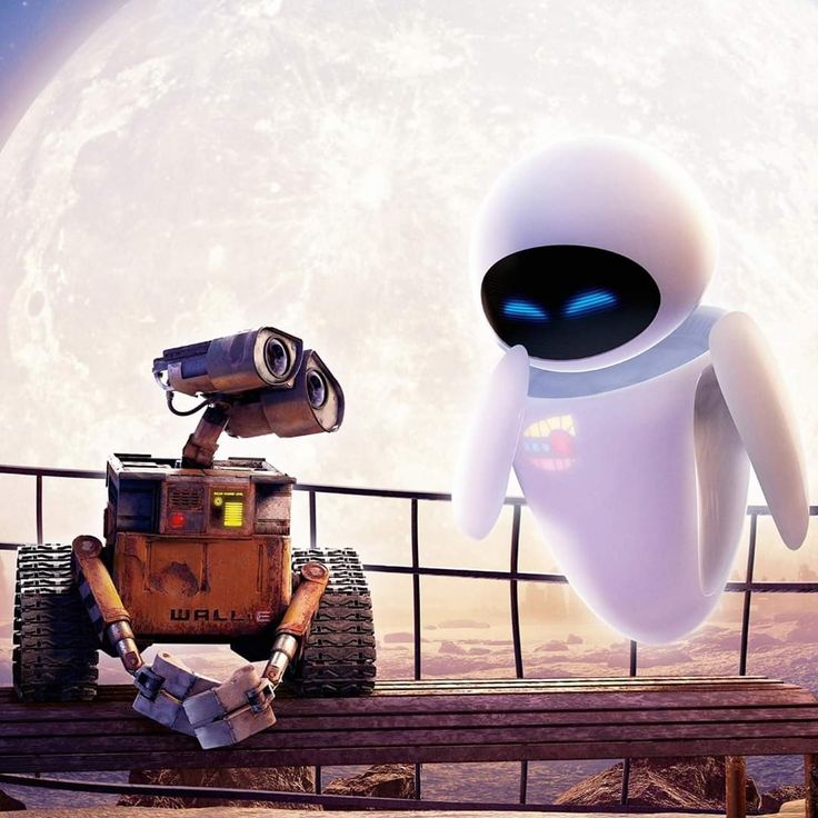 WALL-E robot with treads next to sleek white EVE robot on platform