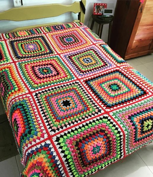 Colorful abstract pattern with mixed shapes and hues.