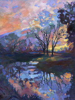 Impressionist painting of a vivid sunset with pink and orange sky reflected in a still pond, framed by silhouetted trees.