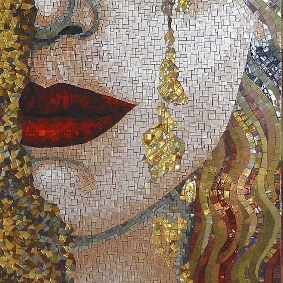 Close-up mosaic of a woman's face with red lips and a gold earring