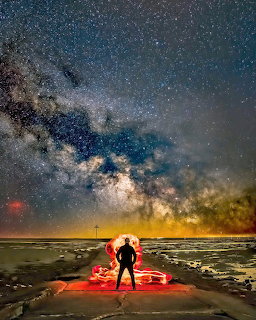 Fire Light Painting Under Milky Way