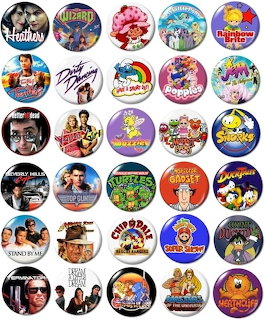Grid of 30 circular vintage pop culture buttons with cartoon and celebrity designs
