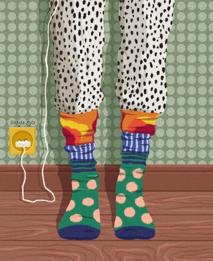 Illustration of legs in black and white polka dot pajamas wearing colorful mismatched socks on wooden floor