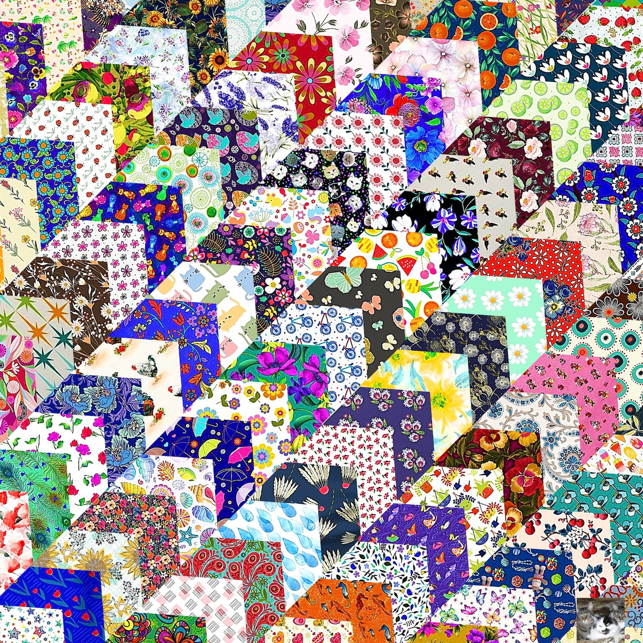 Dense patchwork quilt pattern with colorful fabric squares in various prints and designs