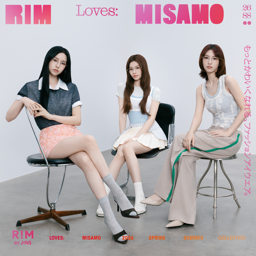 Three women sitting on chairs in a studio-style portrait with pink text on a light background.