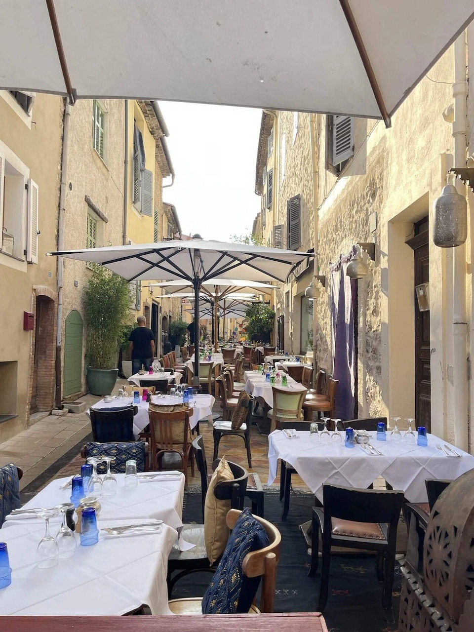 Street scene in the historic village of Valbonne, France with Provençal buildings