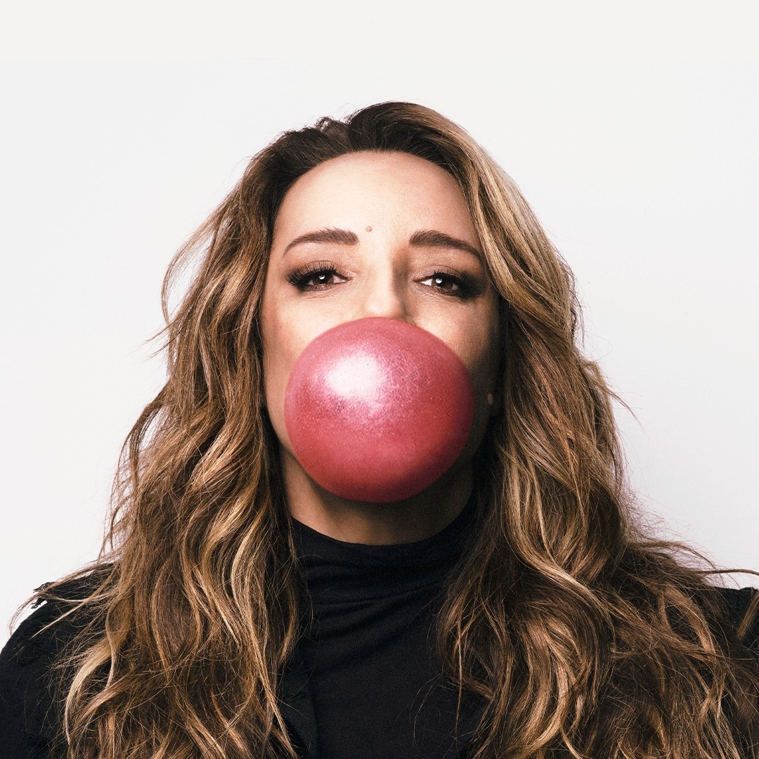 Woman Blowing Pink Bubble Gum