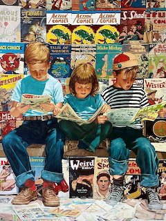Three children in casual clothes sitting and reading comic books with a comic book collage wall behind them