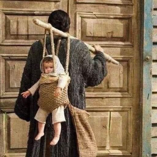 Woman Carrying Baby