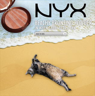 Cat lying on sand under a fake NYX bronzing powder beach ad