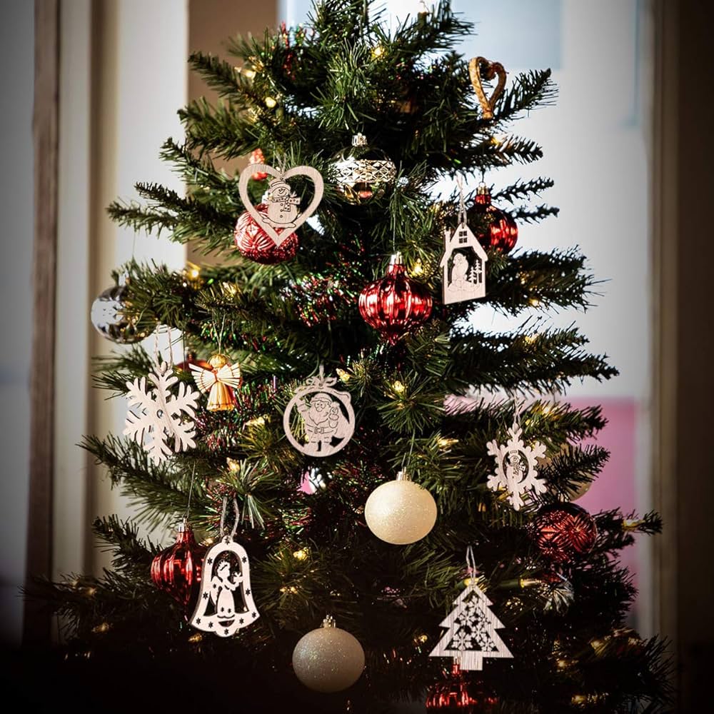 Decorated Christmas tree with ornaments and lights indoors