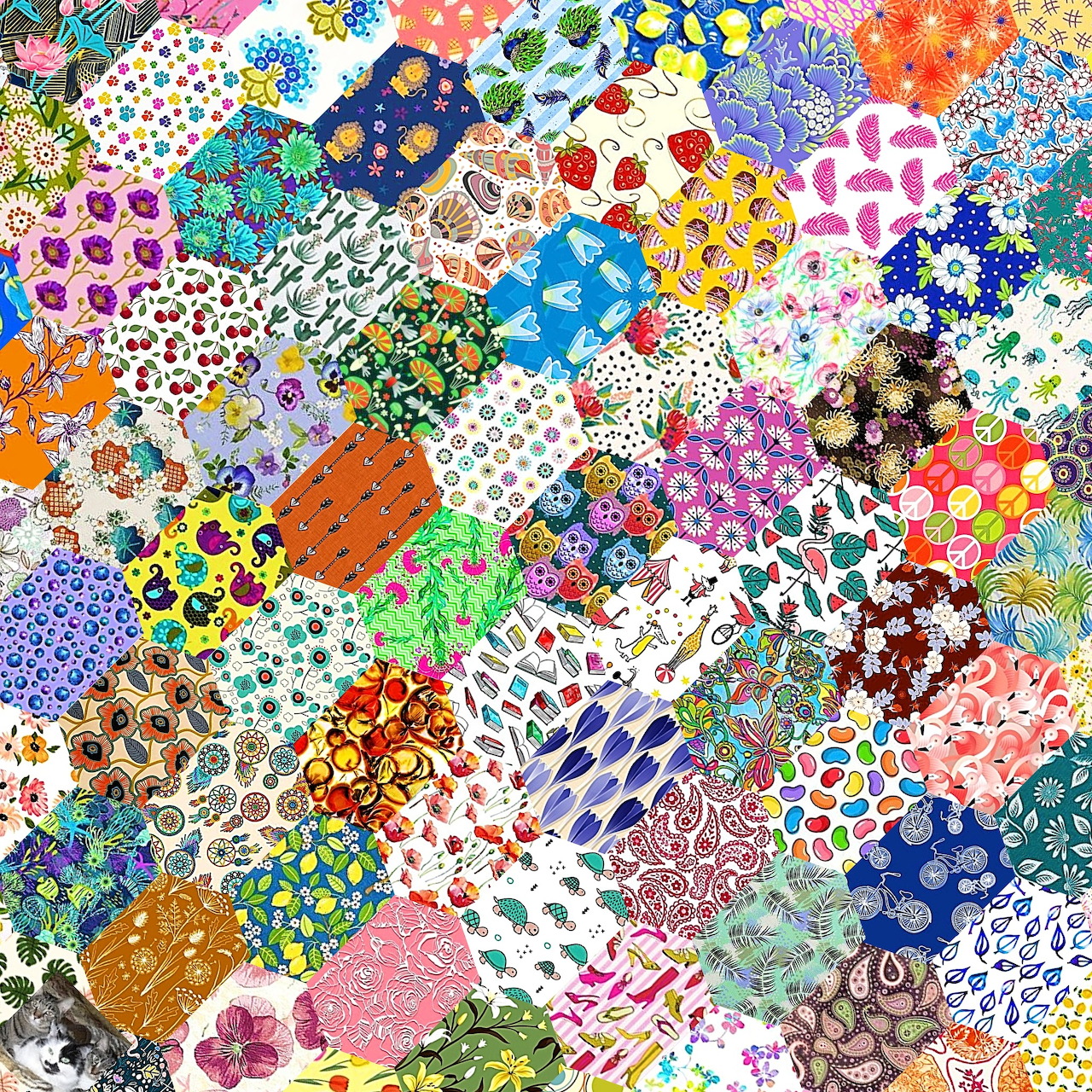 Colorful patchwork quilt pattern with various floral prints, polka dots, and geometric designs in vibrant colors