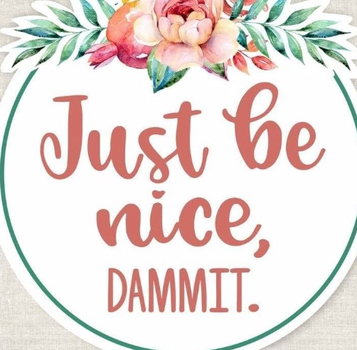 Circular sign reading Just be nice dammit with pink peony flowers and green leaves on cream background