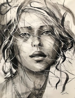 Black and white sketch portrait of woman with windswept hair and expressive linework